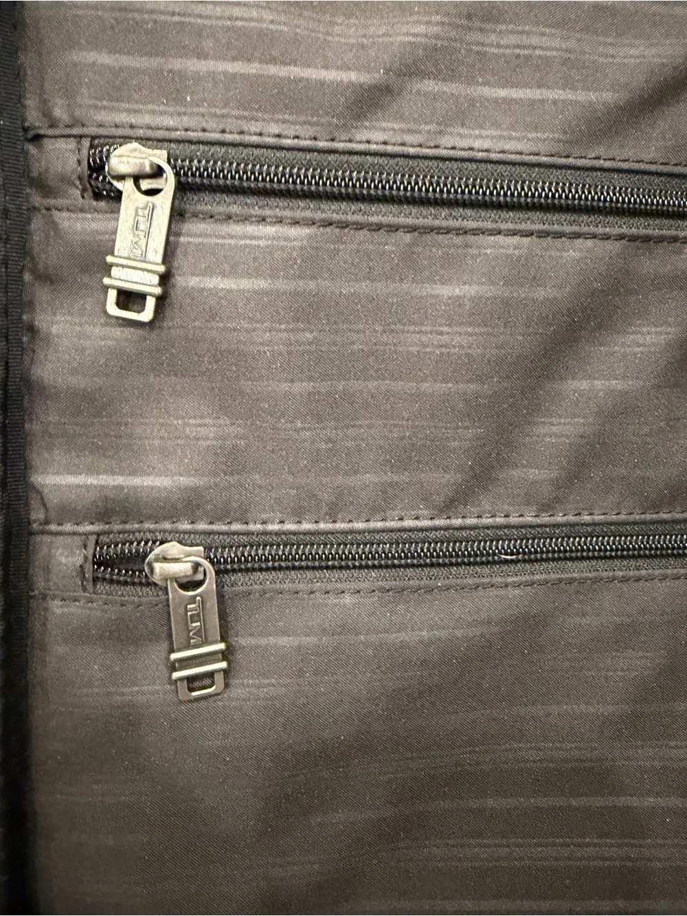Tumi Navy Softside Carry-On Spinner
